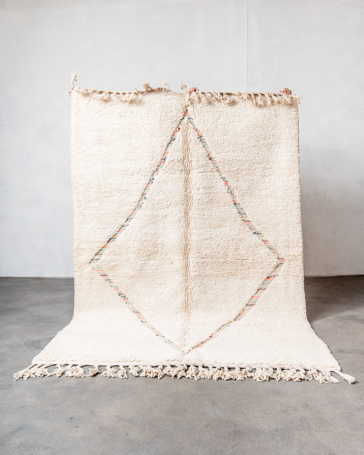 Modern, designer, handcrafted Berber rug from Morocco. Beniourain carpet with beautiful colours and patterns and fluffy wool texture.